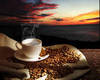 A cup of coffee and a sunset