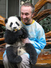 Cuddling a baby Giant Panda!